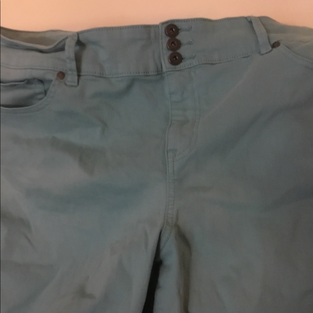 Torrid aqua jeggings size 24w.  3 button one zipper fastenings